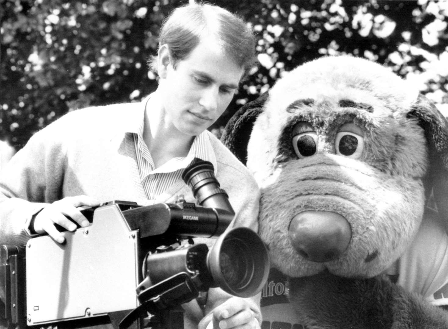 Prince Edward with a TV camera at Alton Towers Theme Park in 1987 (PA)