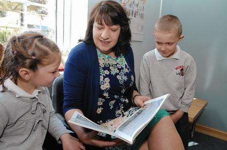 Fiona Judge, the new head, with two of her pupils at Murston Infant School