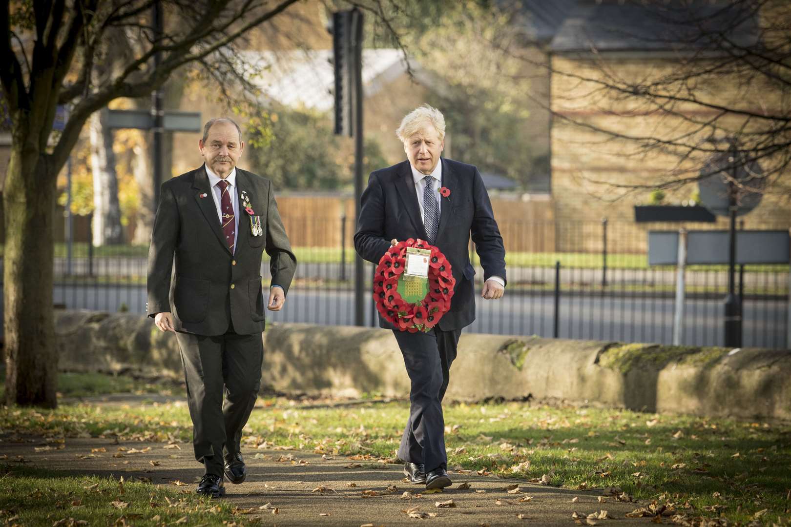 Boris Johnson with Ian Ritchie, from Hillingdon and District Royal British Legion, before laying a wreath