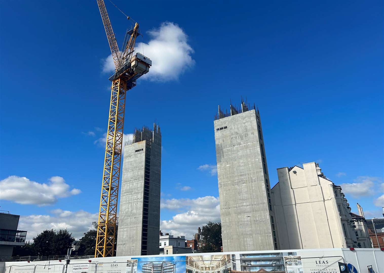 How the site along The Leas looks today. Two huge towers have been erected, and a large crane remains in place