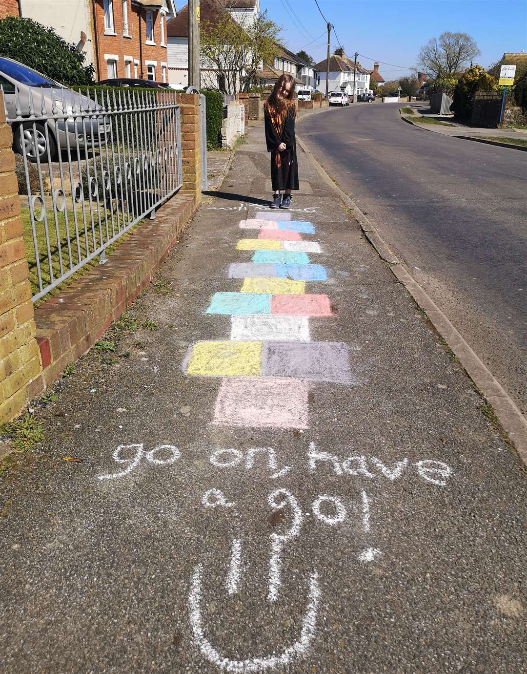 Heather Elder sent in this picture of her daughter Sofia Friday, aged seven from Dymchurch, a Lympne Primary school pupil. She made a big hopscotch along the path for people to do while having their daily exercise