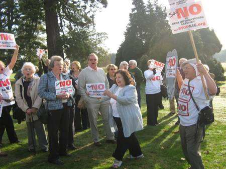 KIG protestors await the start of the public inquiry