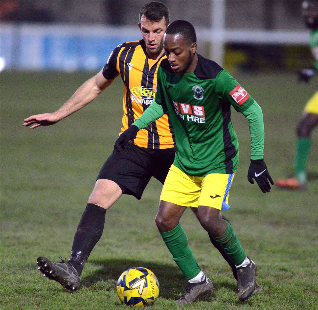 Folkestone's Josh Vincent closely marks an away player. Picture: Randolph File