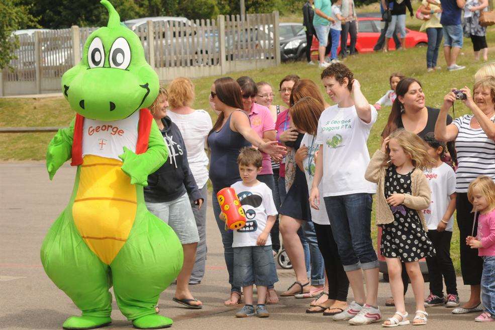 St Georges school fete, Minster. George the dragon, dancing