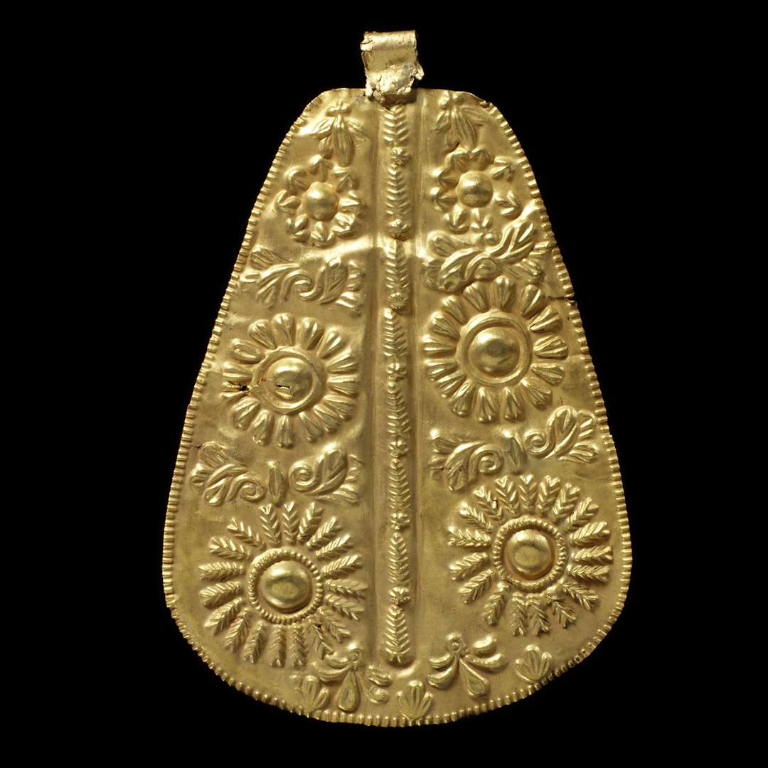 A gold repousse ornament, one of a selection of Asante gold taken from Ghana (V&A/PA)