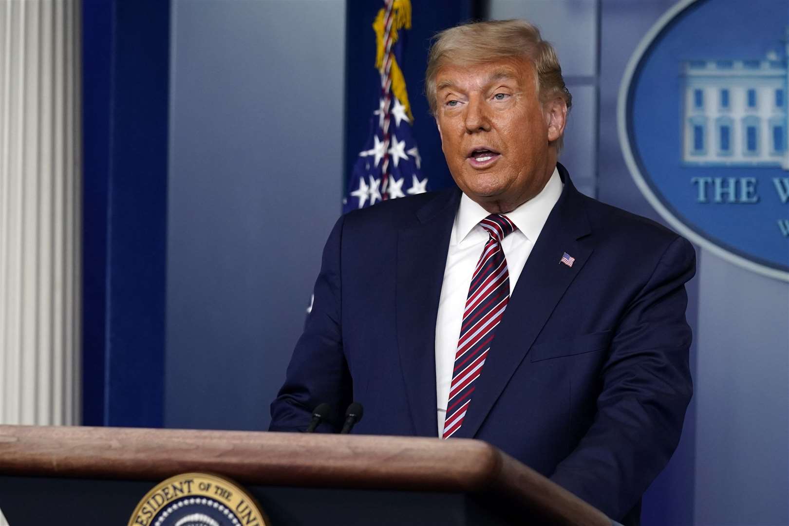 President Donald Trump speaks at the White House (Evan Vucci/AP)