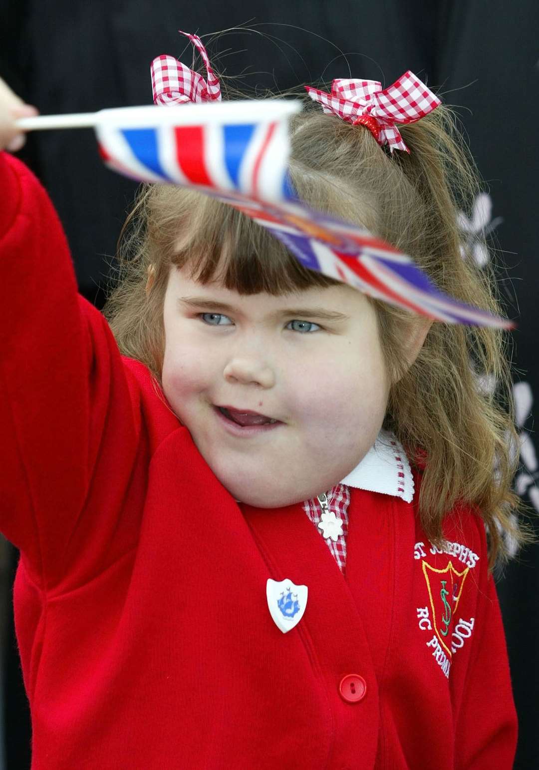 Ms Meehan was picked by her school to curtsey and give the Queen flowers (PA)