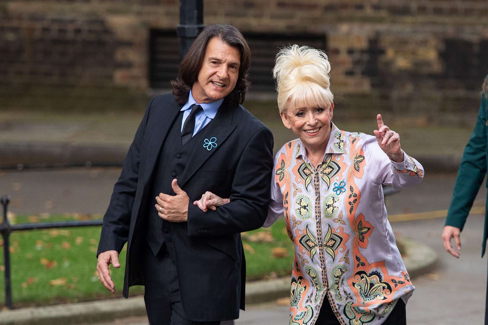 Dame Barbara Windsor and her husband Scott Mitchell deliver an Alzheimer’s Society open letter to 10 Downing Street in September 2019 (PA)