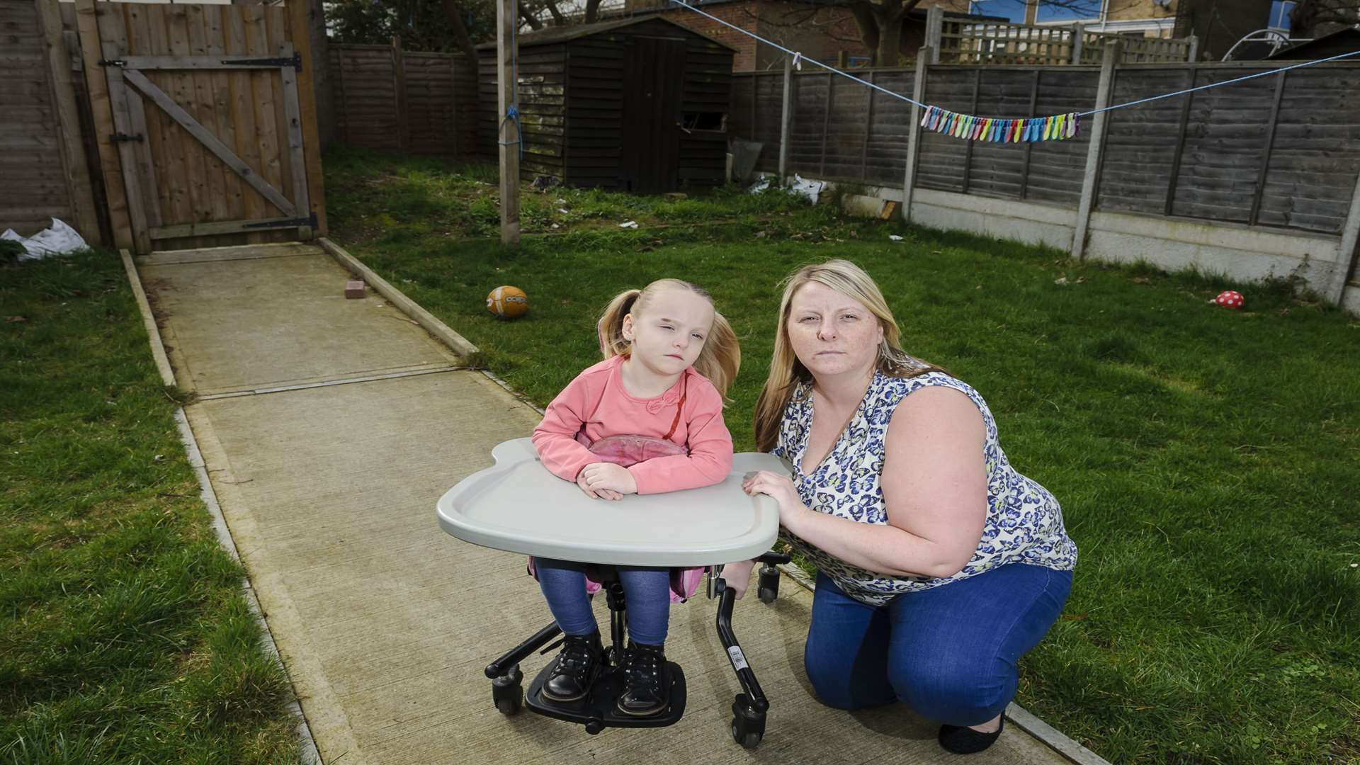 Joanne and Hannah in the garden as it looked before