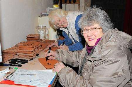 Lena Jordan and Shirley Harper with roof the tiles