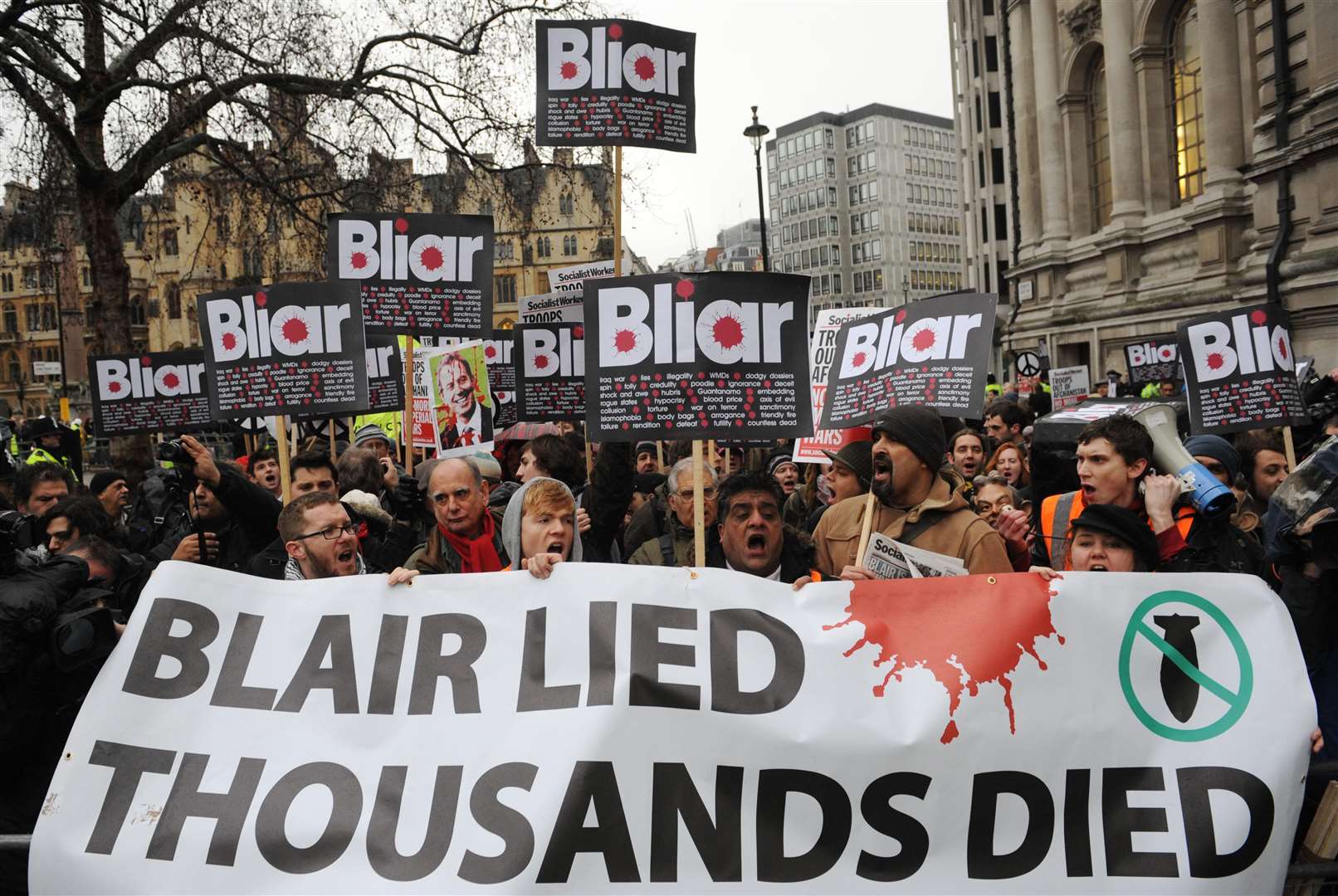 Demonstrators protest in London as Tony Blair was due to give evidence at the Iraq war inquiry (Stefan Rousseau/PA)