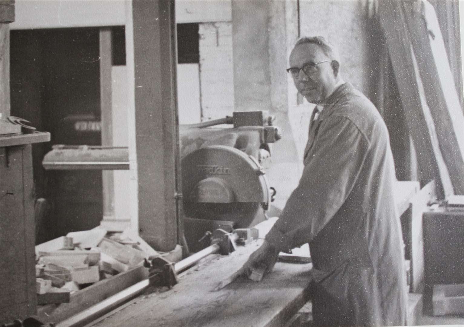 Nelson Dunmall, the Goodsell and Son workshop foreman in 1960. The saw is still there today.