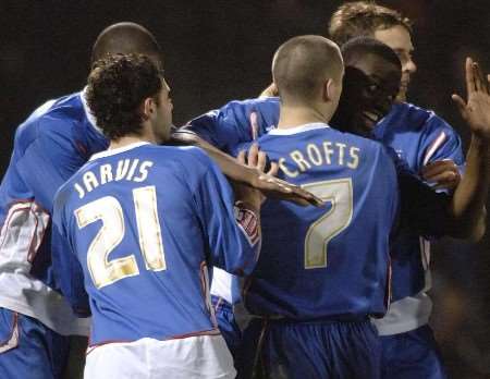 Gillingham players celebrate Ndumbu-Nsungu's penalty success. Picture: GRANT FALVEY