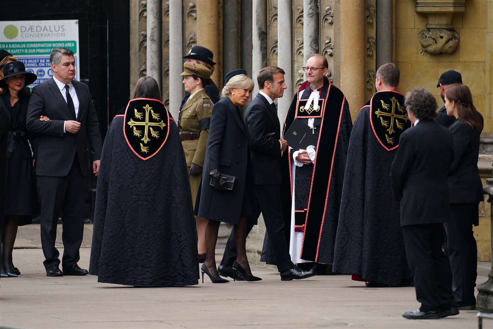 France’s Emmanuel Macron (centre) could be the first foreign leader to host the new monarch (Peter Byrne/PA)