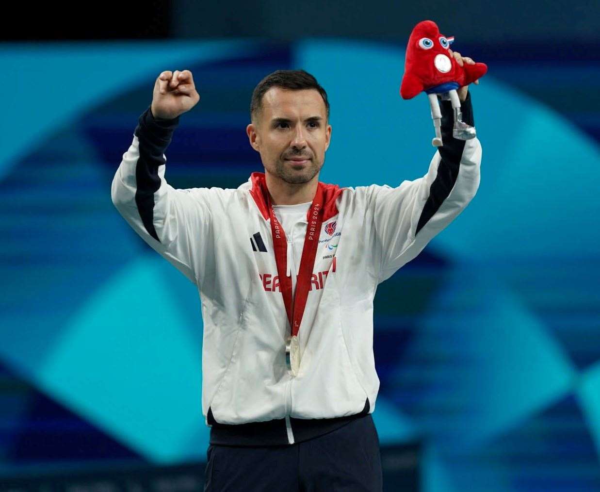 Tunbridge Wells' Will Bayley salutes his supporters after receiving silver after a 3-2 defeat to China's Yan Shuo in the class 7 men's singles table tennis final at the Paris Paralympics. Picture: imagecomms