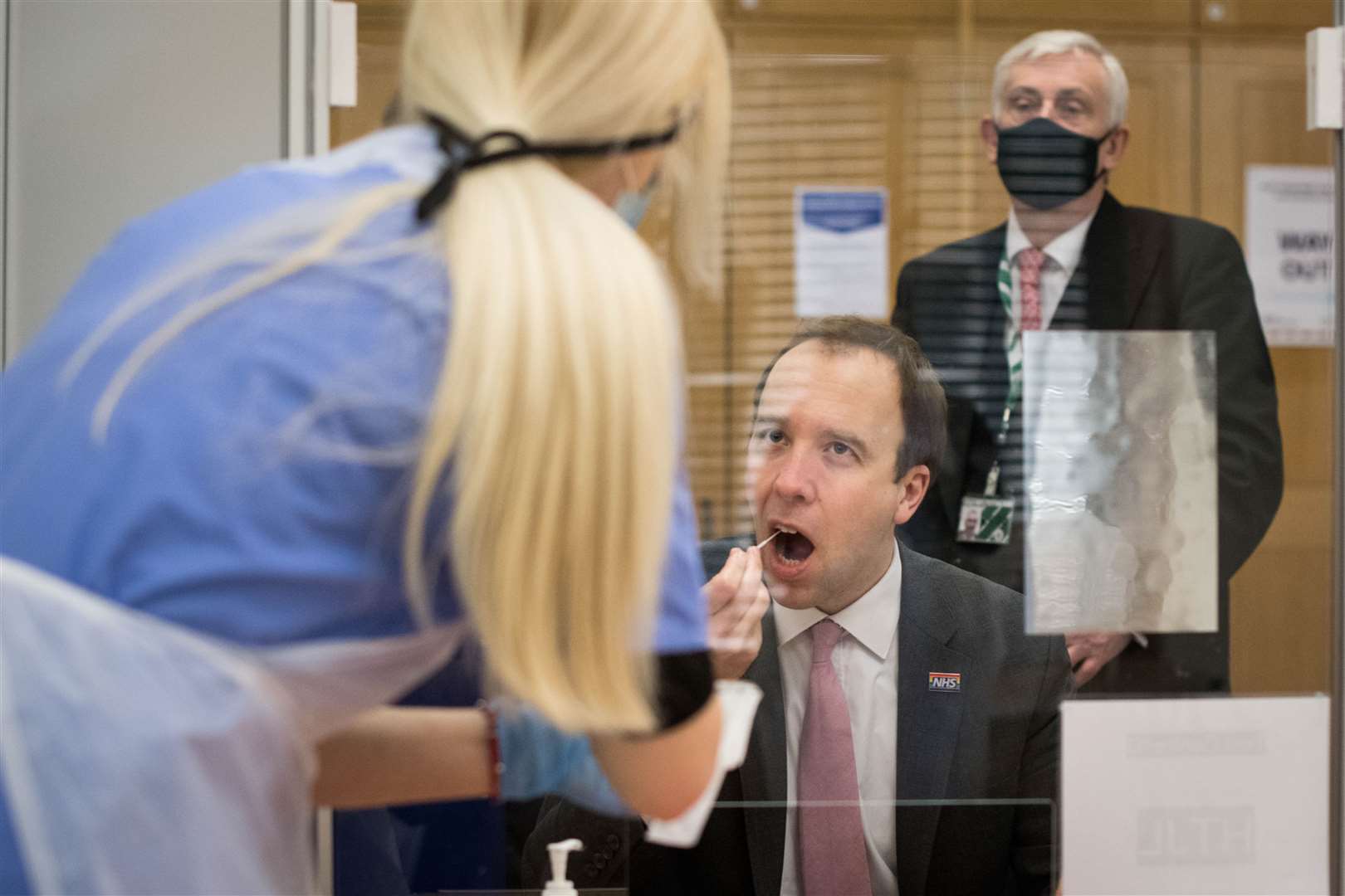 Health Secretary Matt Hancock takes a Covid-19 test at a new facility in the Houses of Parliament (Stefan Rousseau/PA)