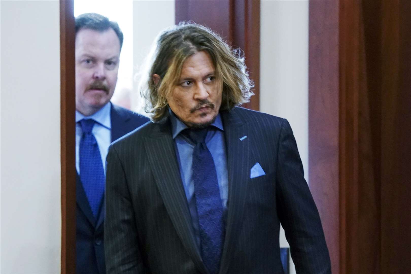 Johnny Depp lost a similar defamation case in the UK (Shawn Thew/AP)