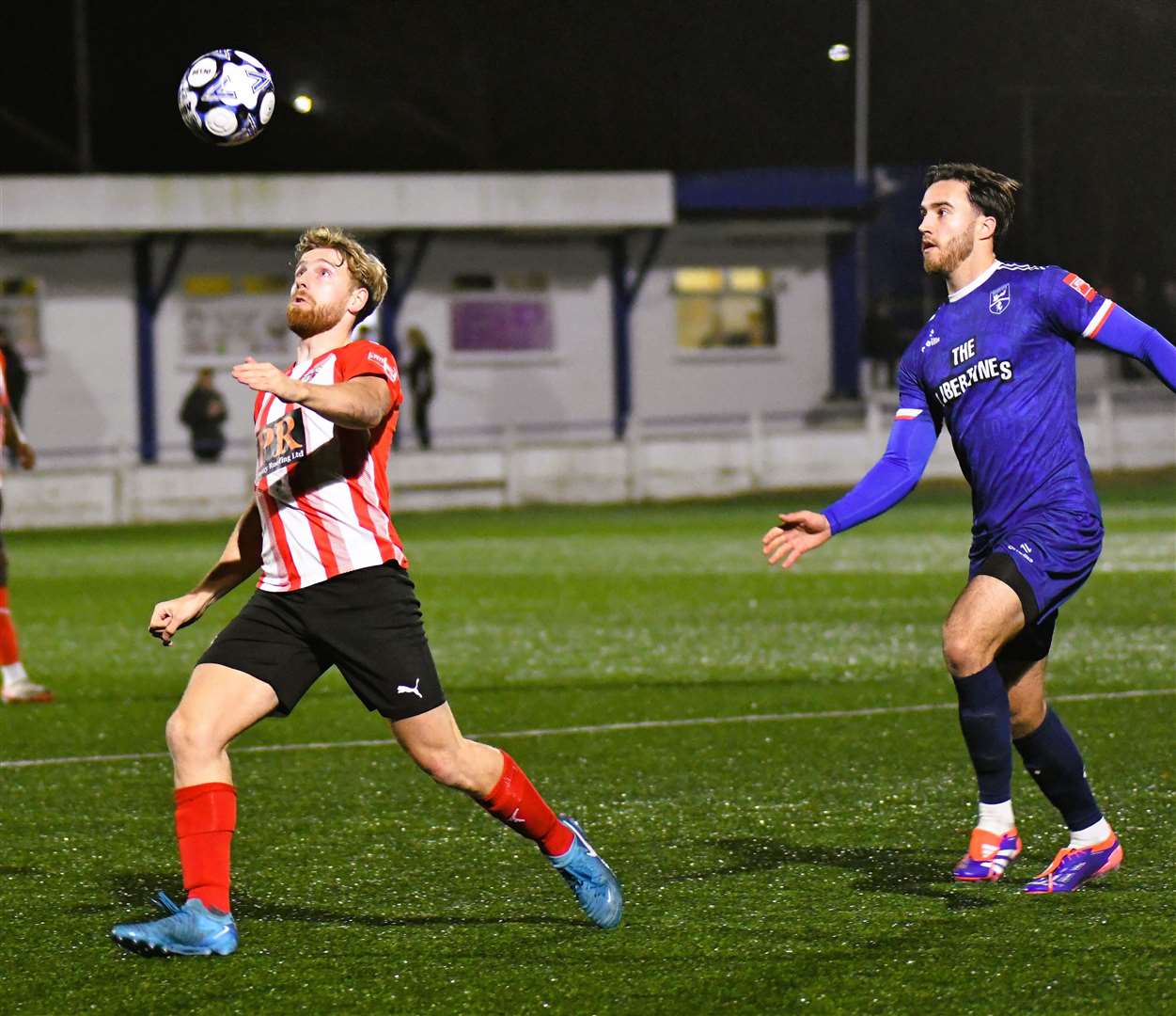 Sheppey's James Taylor and Margate's Max Walsh wait for the ball to drop in midfield. Picture: Marc Richards