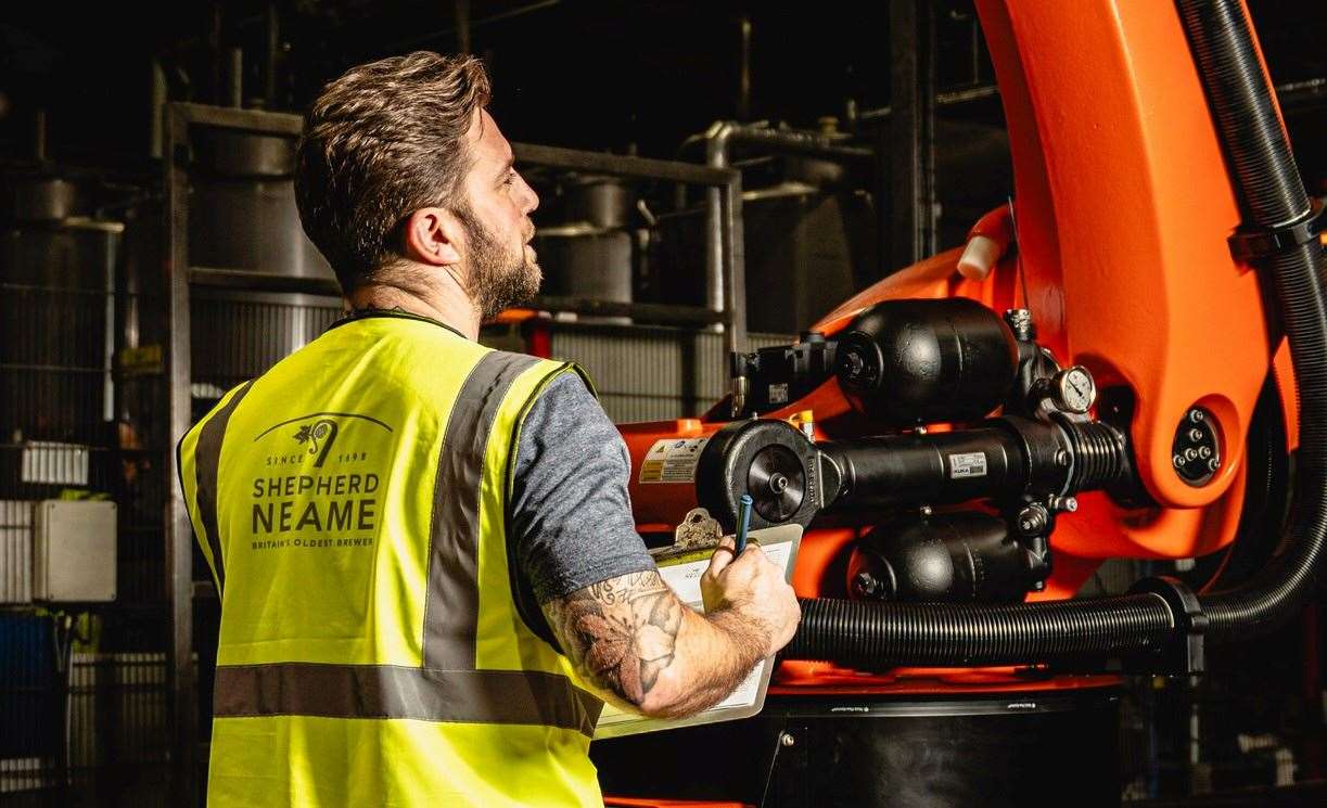 Packaging team leader Damian Hadlow with Frank Jr on the Shepherd Neame keg production line