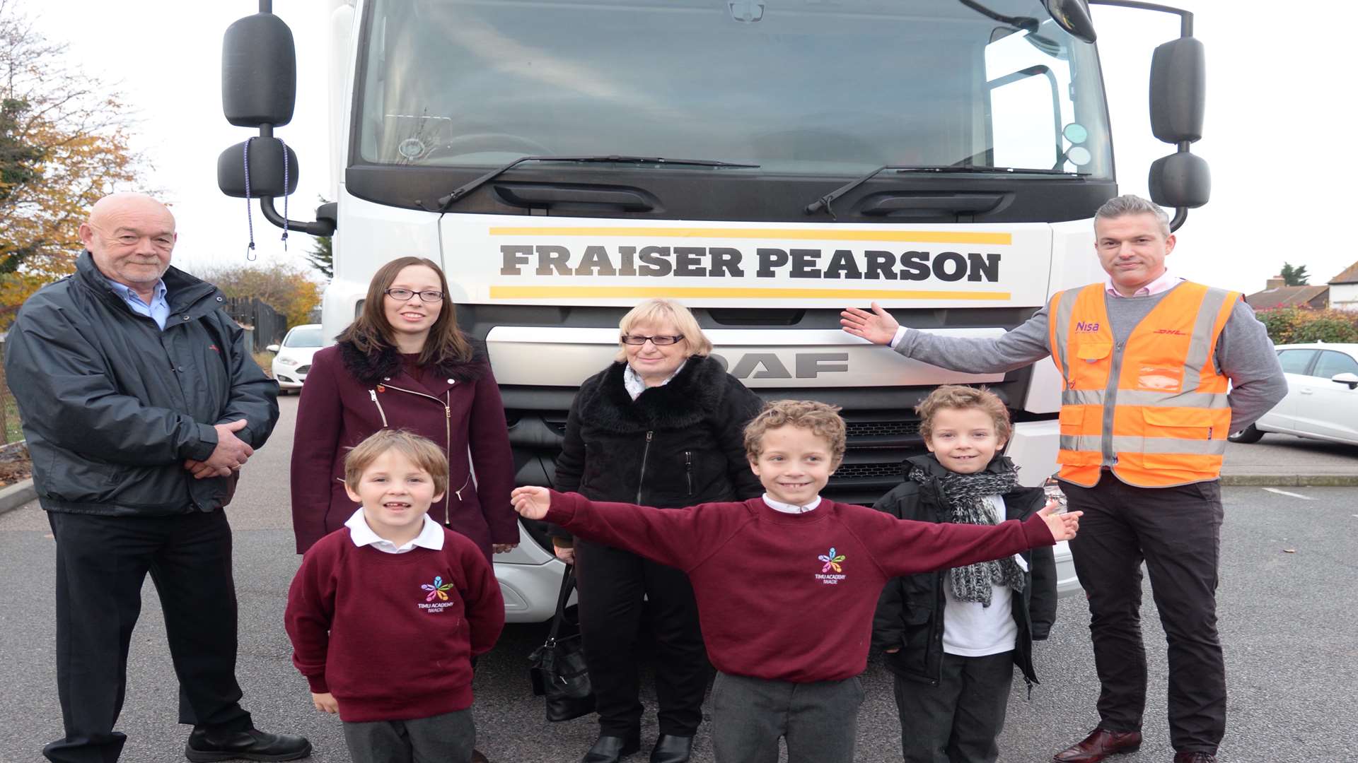 Fraiser Pearson, seven, with the lorry named after him and DHL Driving assessor Philip Starling, mum Abi Hankins, great-grandmother Val Hutchings, Chris Jones, transport manager of DHL/Nisa and brothers Taite and Harley Pearson, both seven.