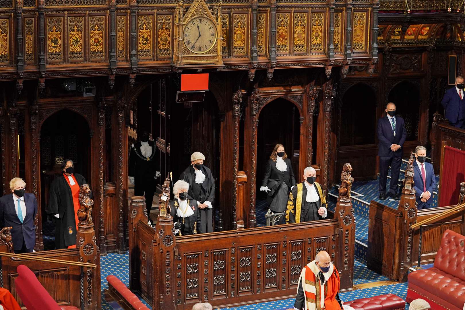 Prime Minister Boris Johnson (left), Black Rod Sarah Clarke, Speaker of the House of Commons Sir Lindsay Hoyle and leader of the opposition Sir Kier Starmer (right) listen to the speech (Aaron Chown/PA)