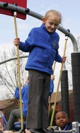 hildren try out the new play park in Springwood Drive, Godinton Park, Ashford