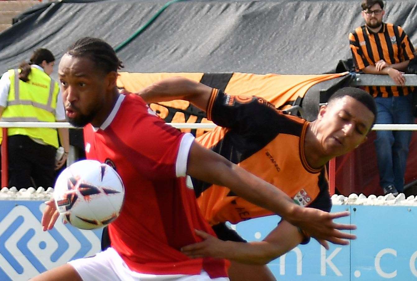 Ebbsfleet striker Kwame Thomas up against ex-Fleet defender Myles Kenlock during the Kent club’s 2-1 home defeat to Barnet on Saturday. Picture: Ed Miller/EUFC