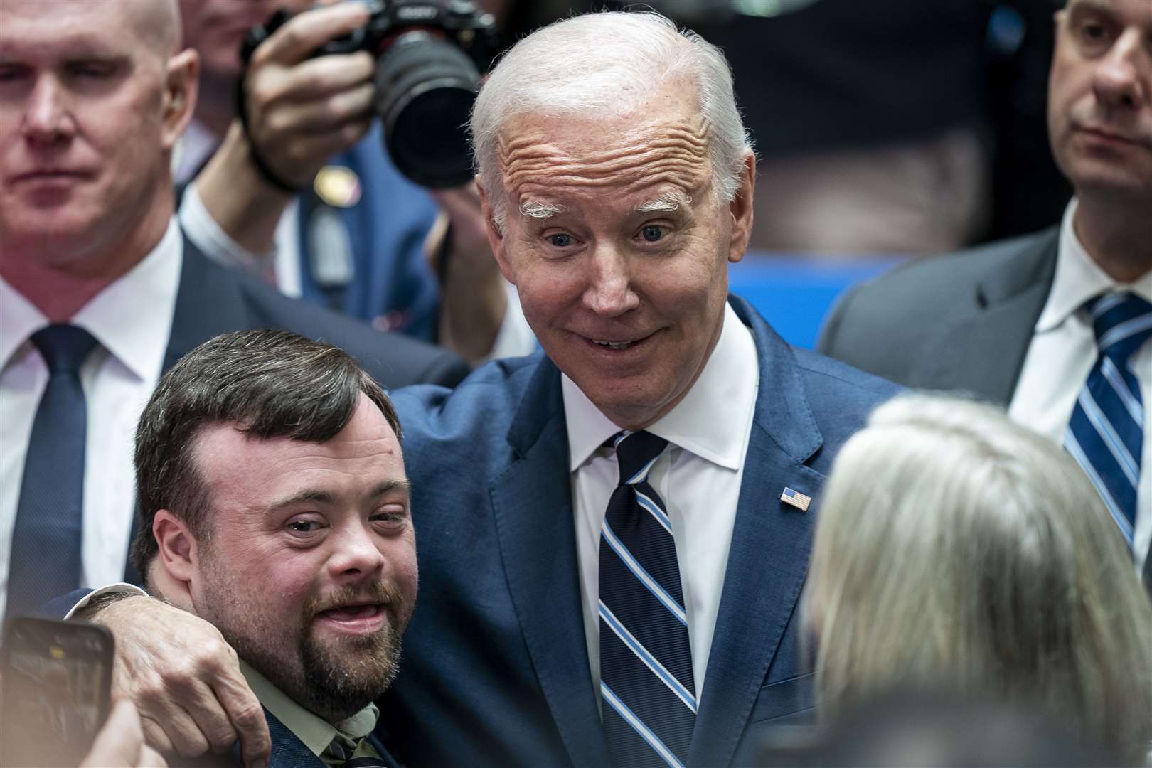 US President Joe Biden embraces James Martin, who starred in the recent Oscar-winning short film An Irish Goodbye, as he visits Ulster University in Belfast (Liam McBurney/PA)