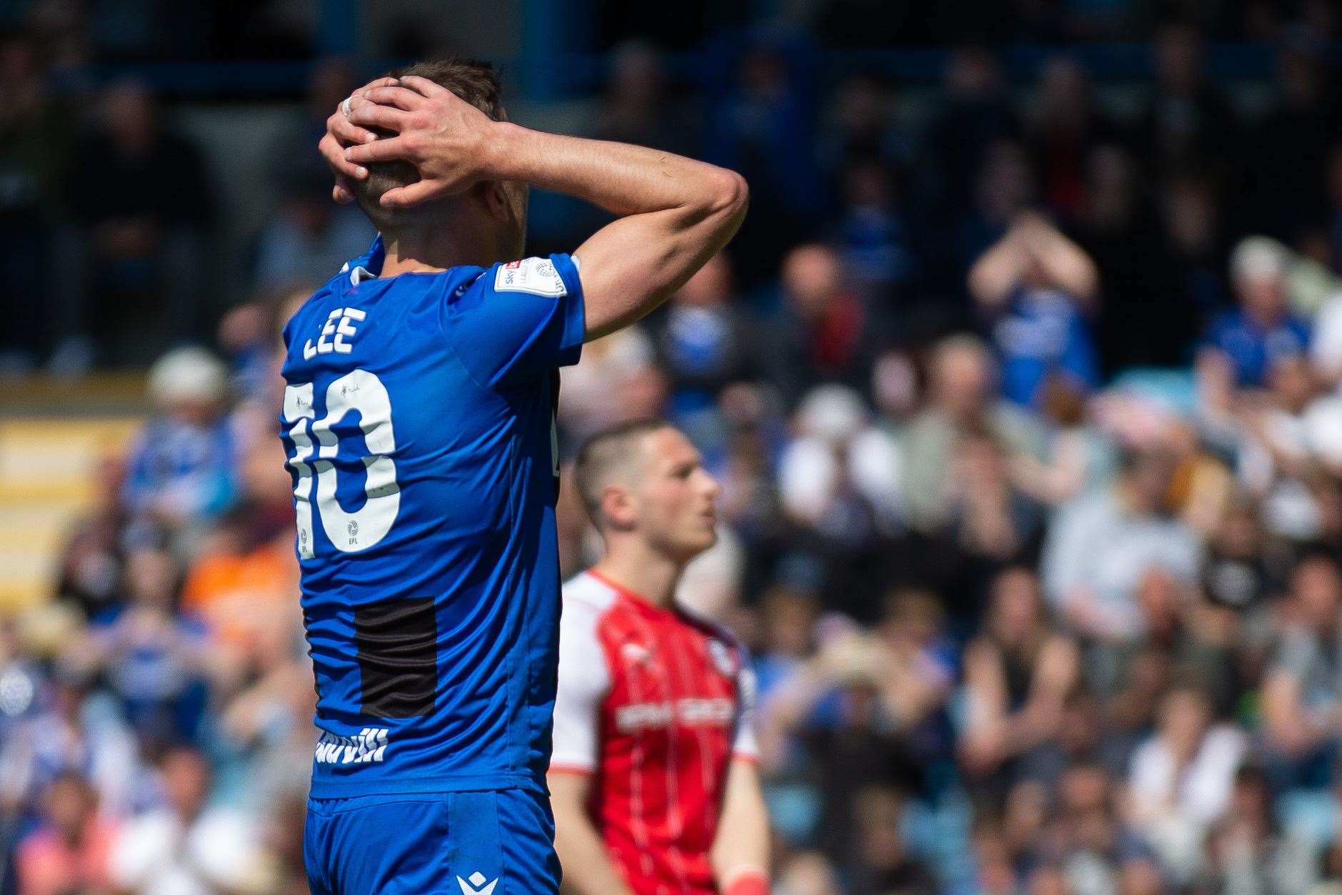 Olly Lee with his head in his hands as Gillingham go down Picture: KPI