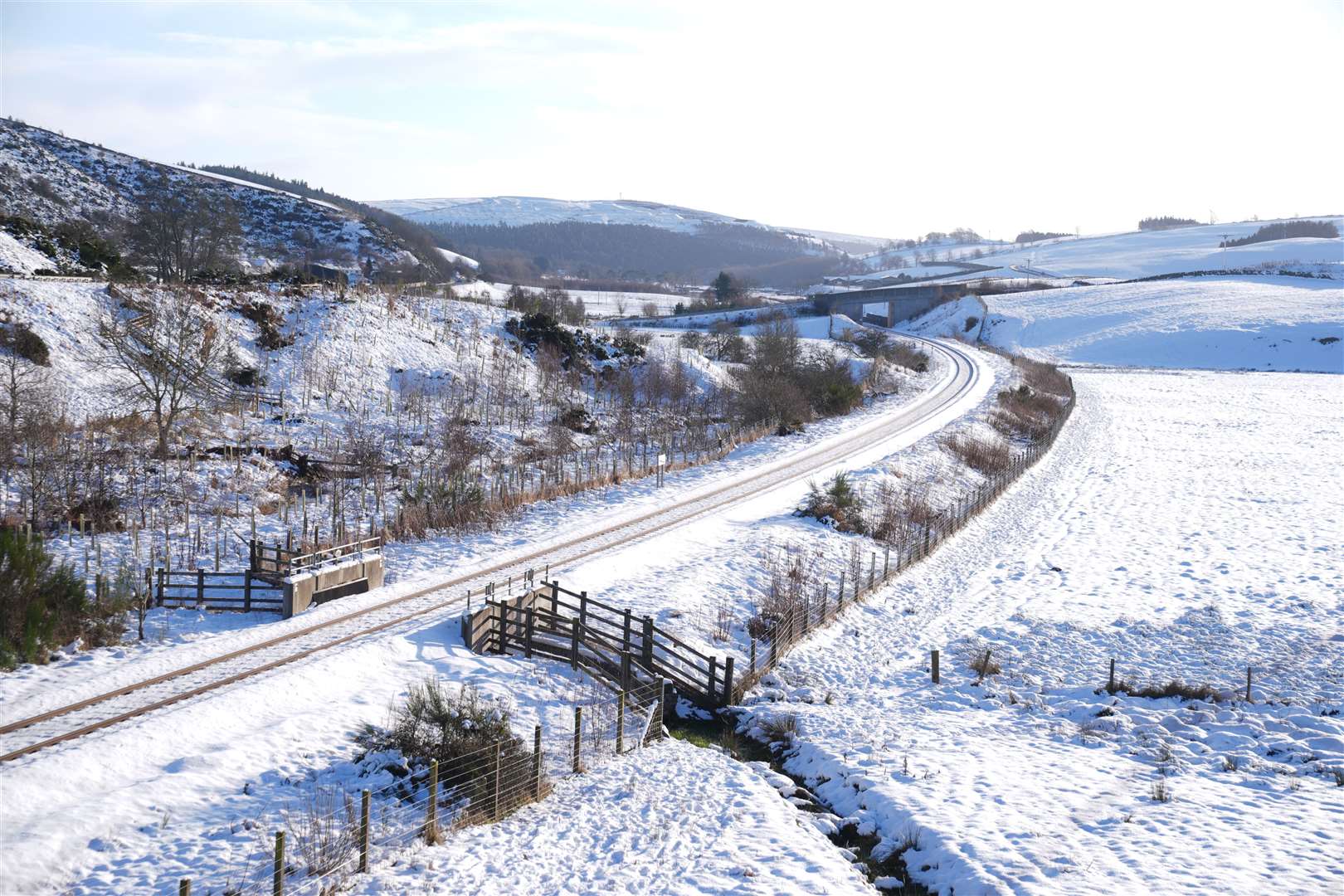 Snowy fields and railway line near Heriot in the Scottish Borders (Andrew Milligan/PA)