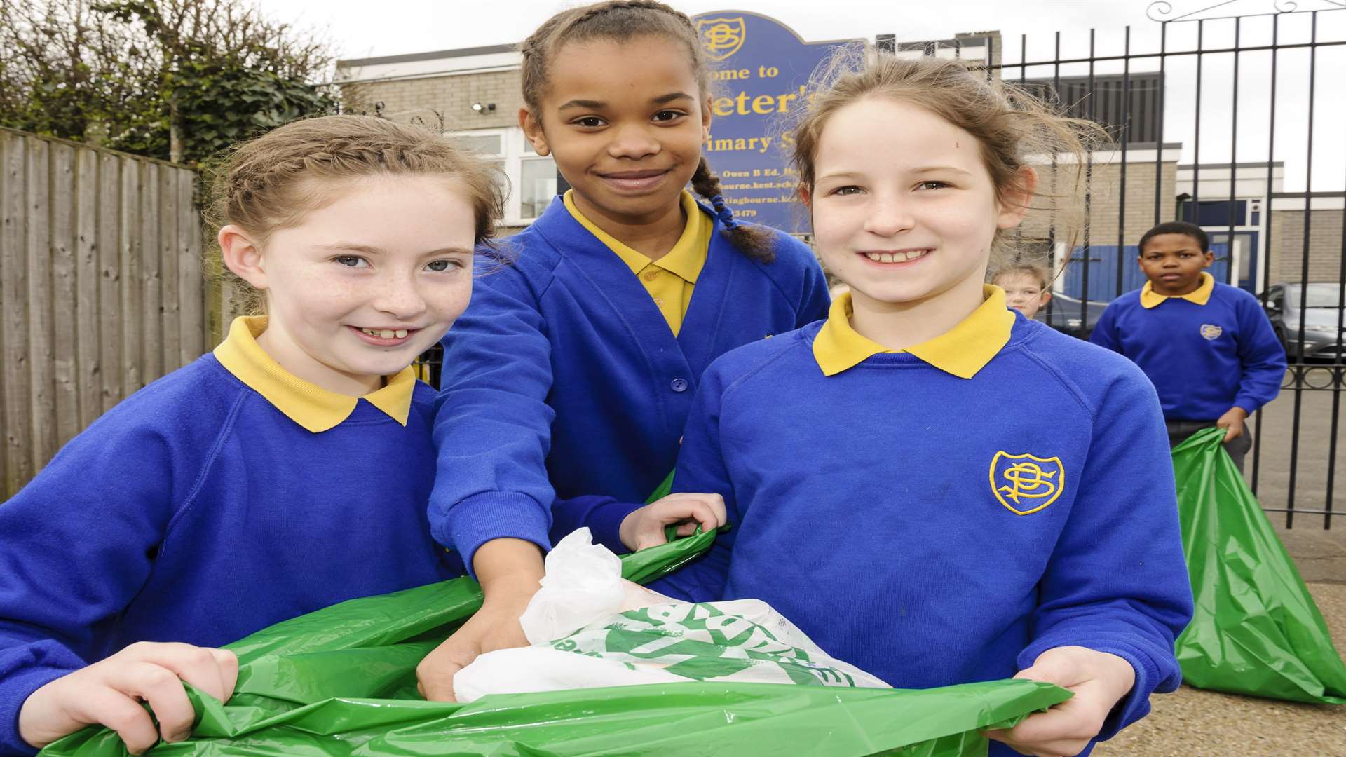 From left, Louise, 10, Samantha, 9 and Jemima, 9. Launch of the litter walk, in aid of the Litter Angels charity, at St Peters RC Primary School, West Ridge, Sittingbourne.