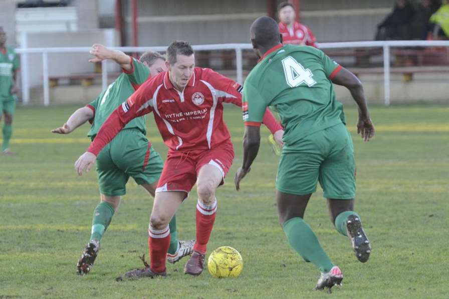 Shaun Welford takes on two Crawley Down defenders (Pic: Gary Browne)