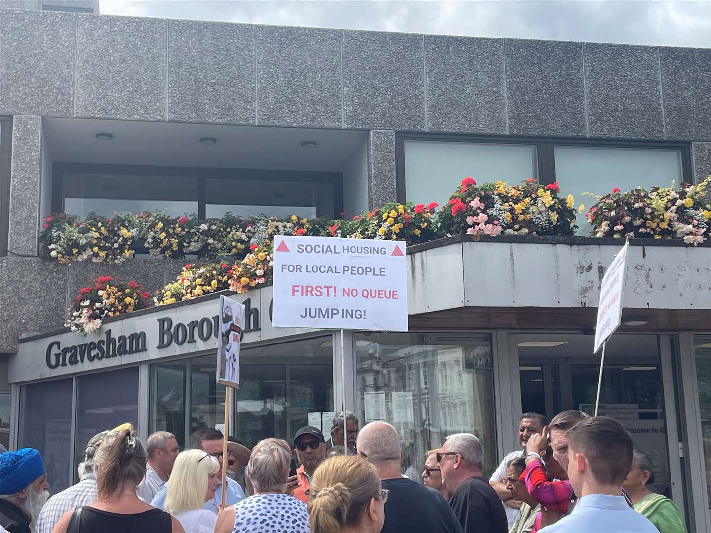 Residents held placards at the demonstration