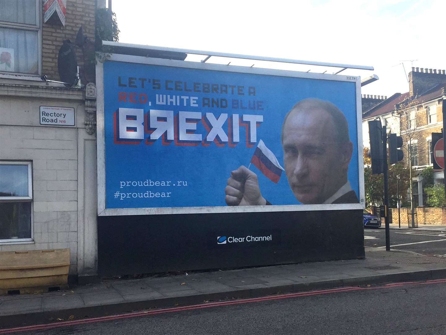 A billboard featuring Russian leader Vladimir Putin, in Stoke Newington, north London (Caitlin Doherty/PA)