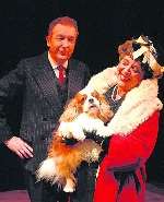 Actors Philip Shaw and Jane Danes with Hovis the dog in a scene from Gypsy at the Granville Theatre, Ramsgate