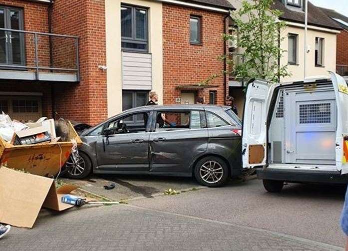 A car which ended up embedded in the skip. Picture Roger Wilkins