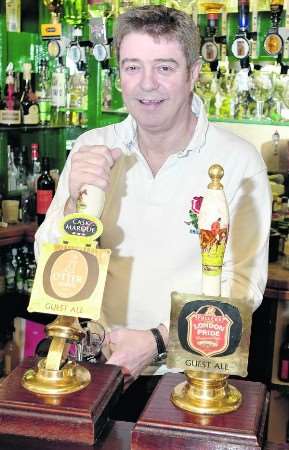 David Gould pulls a pint at the Frog and Toad