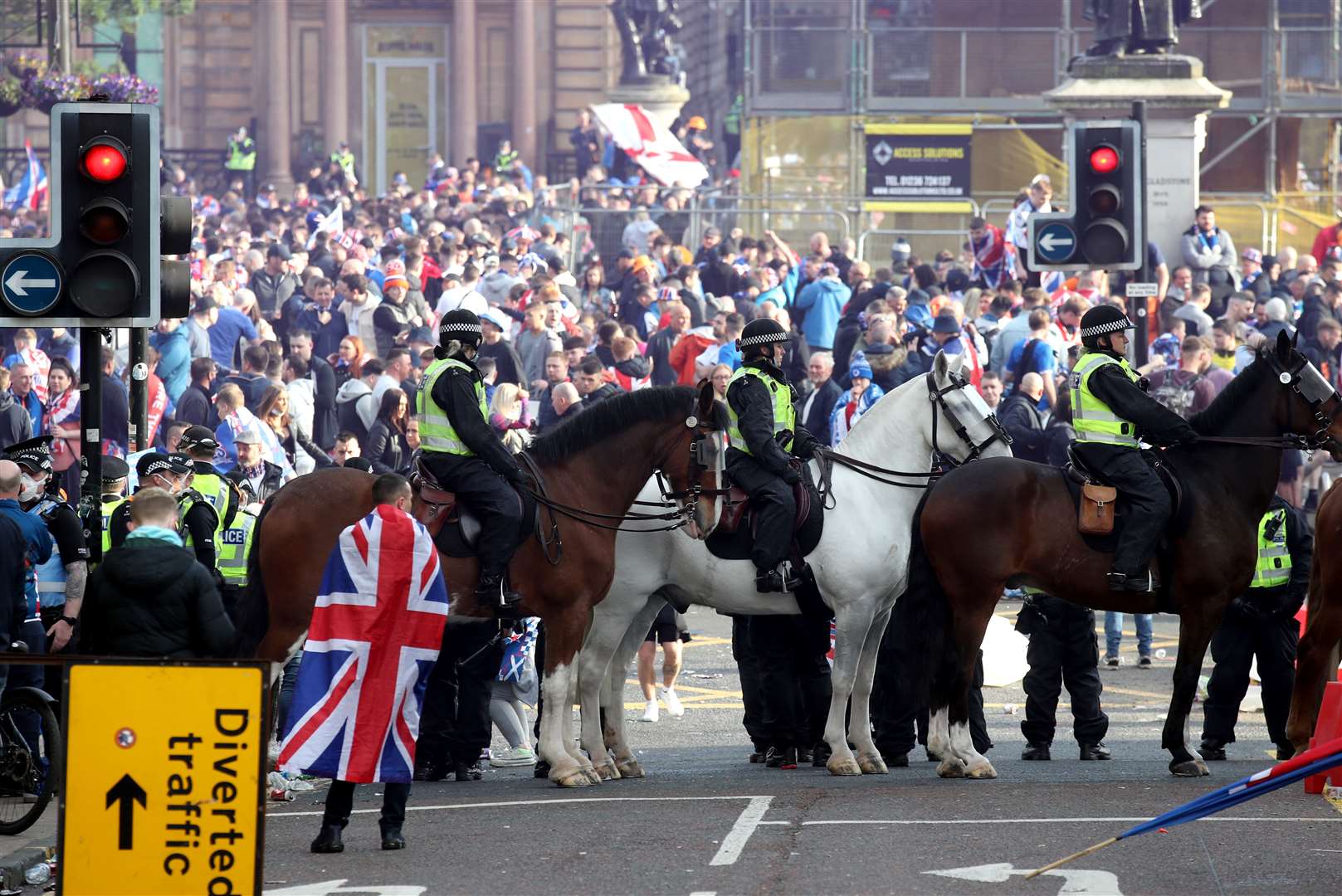 A line of police moved in just after 9pm (Andrew Milligan/PA)