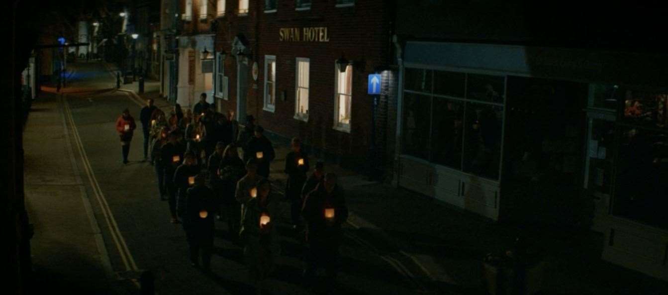 People pass the Swan Hotel in Hythe. Photo: BBC iPlayer