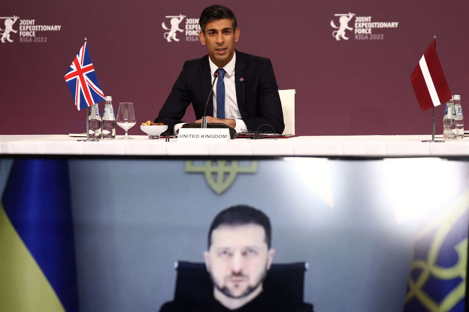 Ukrainian President Volodymyr Zelensky listens via video link as Prime Minister Rishi Sunak speaks during the Joint Expeditionary Force (JEF) Summit in Riga, Latvia (Henry Nicholls)