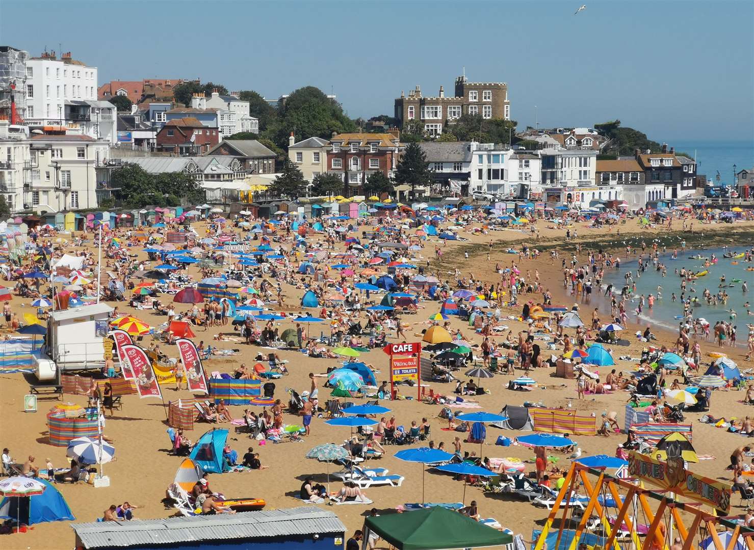 Crowds in Viking Bay in Broadstairs during hot weather