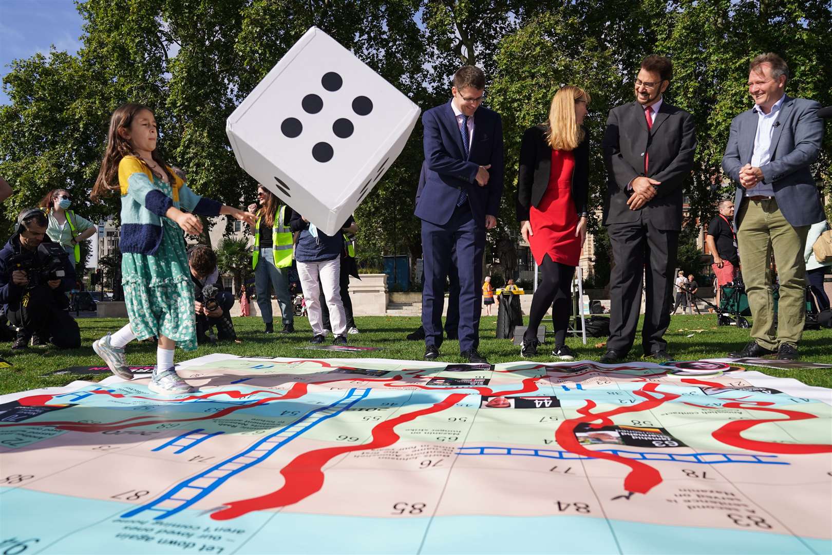 The giant snakes and ladders board in Parliament Square (Kirsty O’Connor/PA)