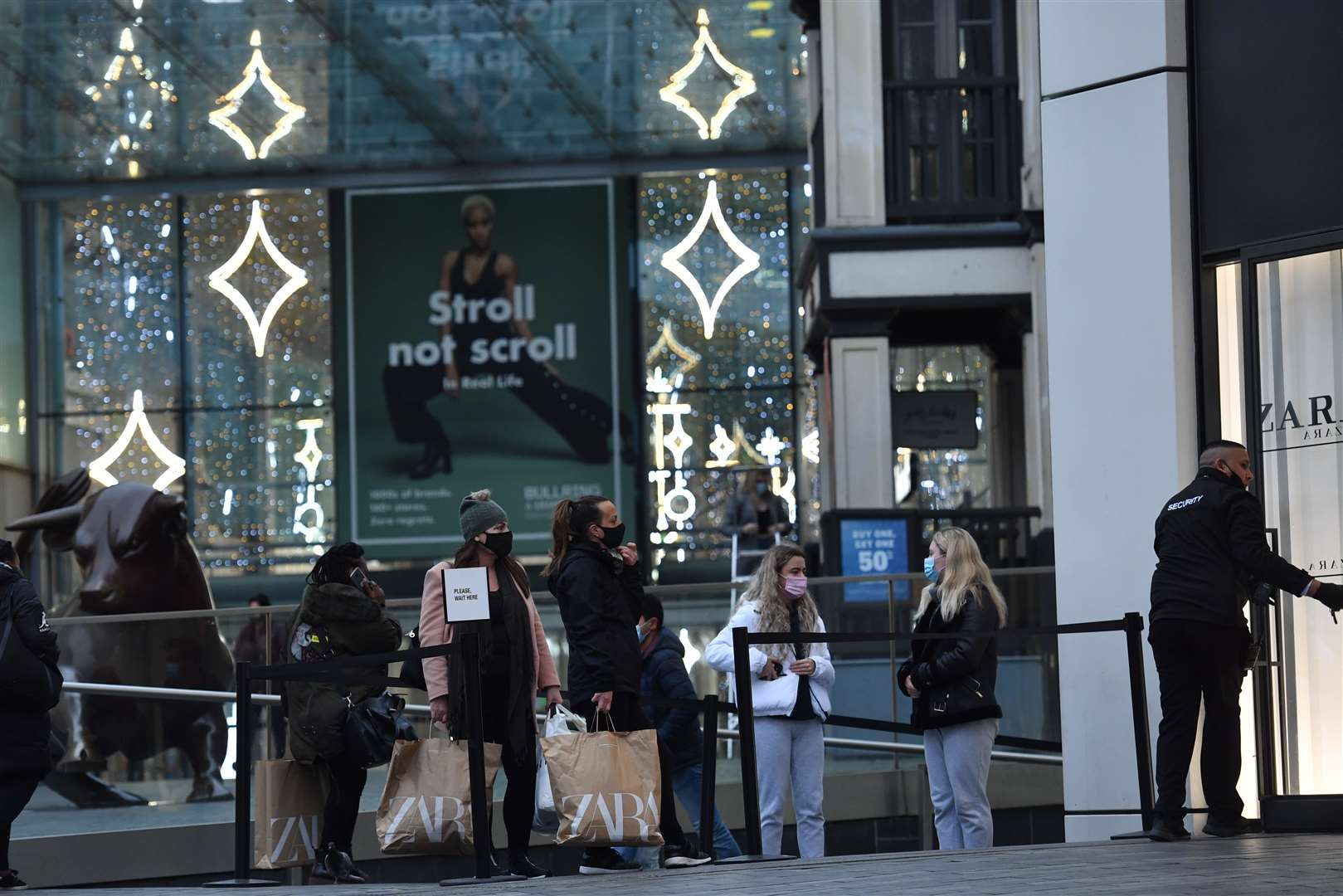 A queue outside Zara in Birmingham (Jacob King/PA)