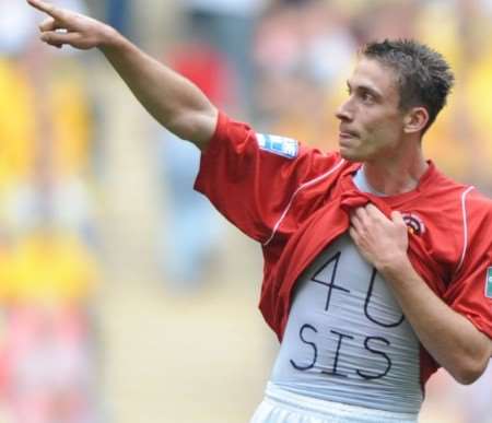 Goalscorer Chris McPhee displays the message to his sister after netting at Wembley. Picture: Barry Goodwin