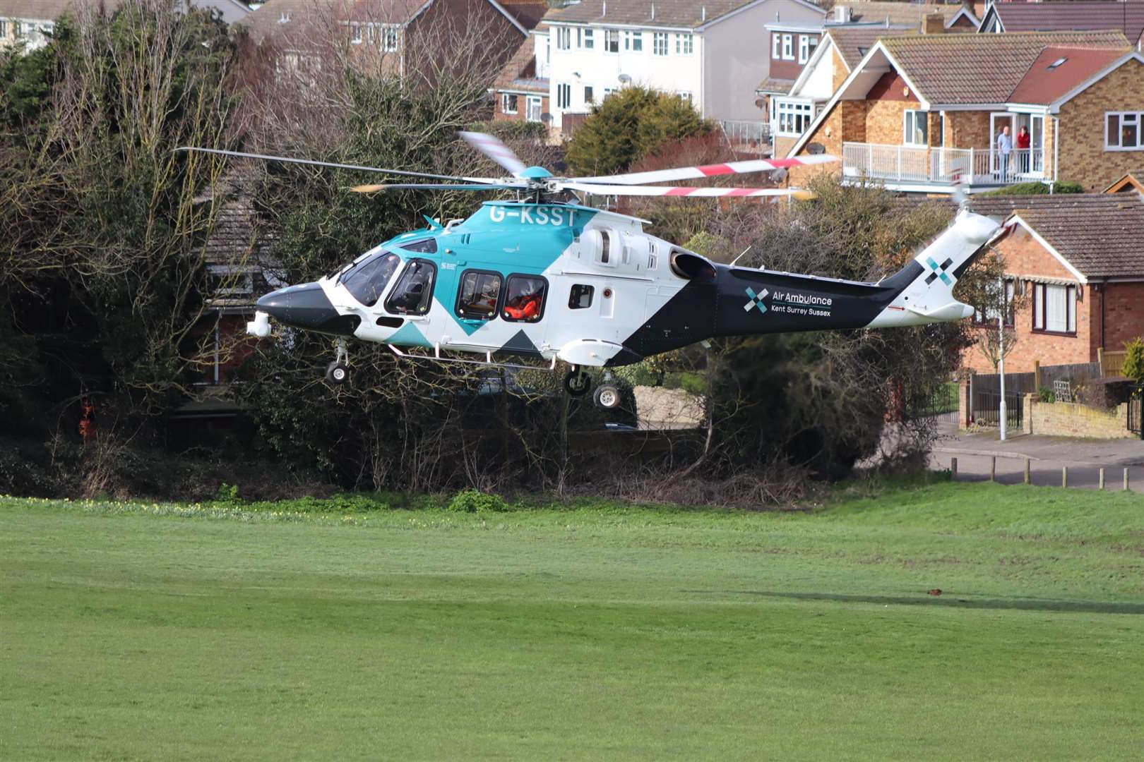 Kent Surrey and Sussex air ambulance taking off from The Glen, Minster, Sheppey