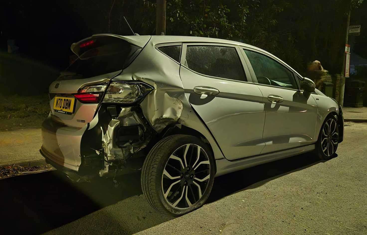 The silver Ford Fiesta has been badly damaged by the crash. Photo: Paul Mercer