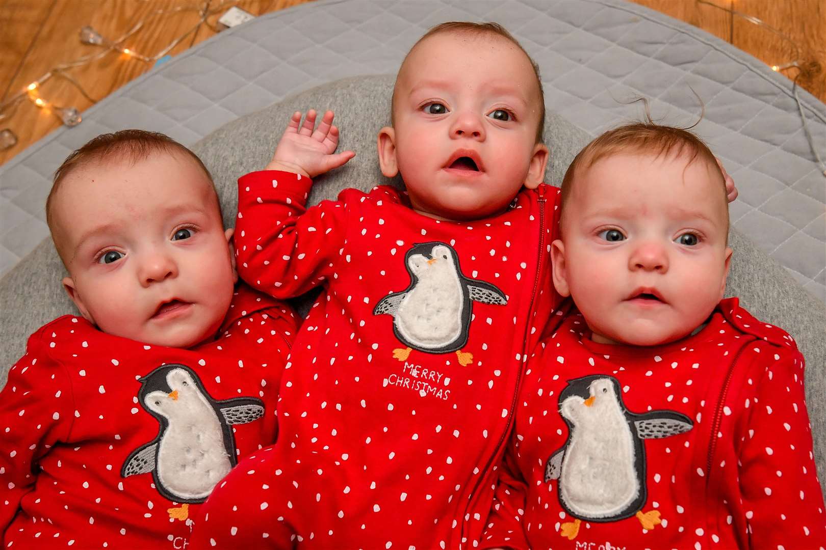 Triplets Rafferty, Willoughby and Emmeline love twinkly lights, mother Sarah Davis said (Ben Birchall/PA)