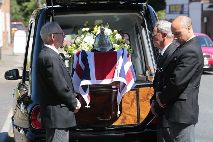 The coffin arrives at the church