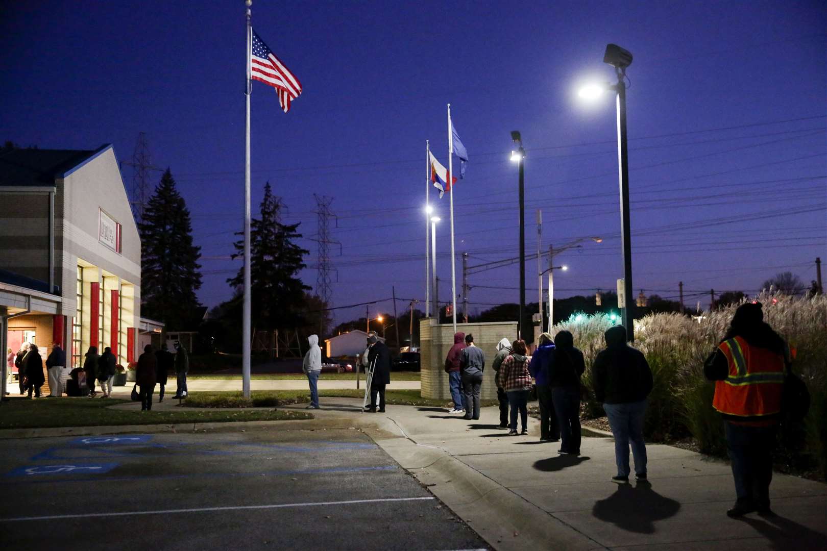 Voters had queued for hours to vote at some polling stations (AP)