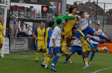 Gillingham defend their goal from a Welling attack